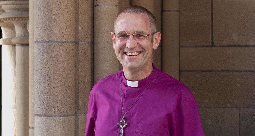 Image of Bishop John Roundhill outside the Cathedral