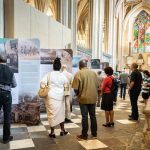 Visitors viewing the exhibition "All God's Children