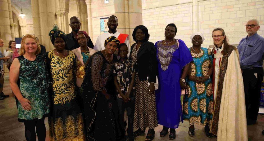 The Rev'd Mamuor Kunpeter, pictured with family and friends on the occasion of his ordination to the diaconate in December 2022