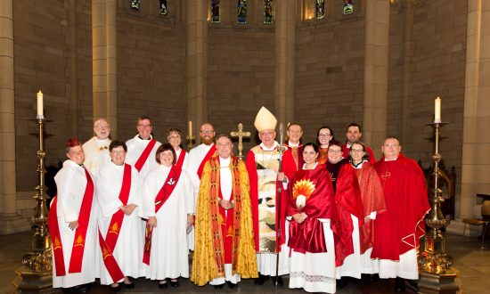 Deacons and priests, along with Archbishop Phillip Aspinall and The Ven. Keith Dean-Jones, in December 2018