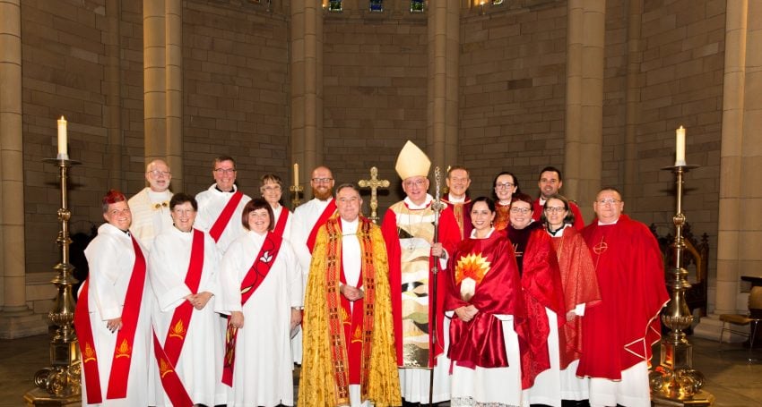 Deacons and priests, along with Archbishop Phillip Aspinall and The Ven. Keith Dean-Jones, in December 2018