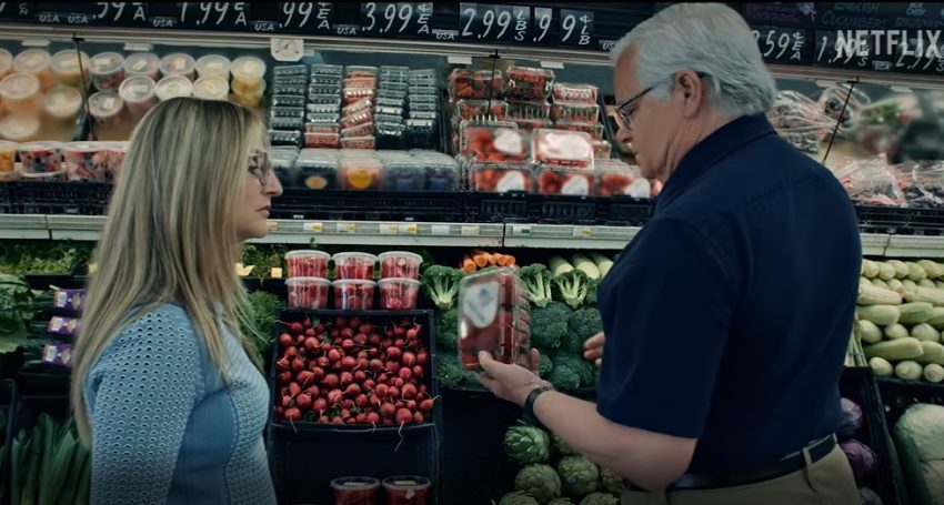 Two people in a supermarket