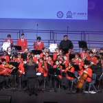 St John's Anglican College's String and Wind Orchestra perform "Queensland Quest" at the St John's 30th Foundation Day Celebration, 27 July 2023