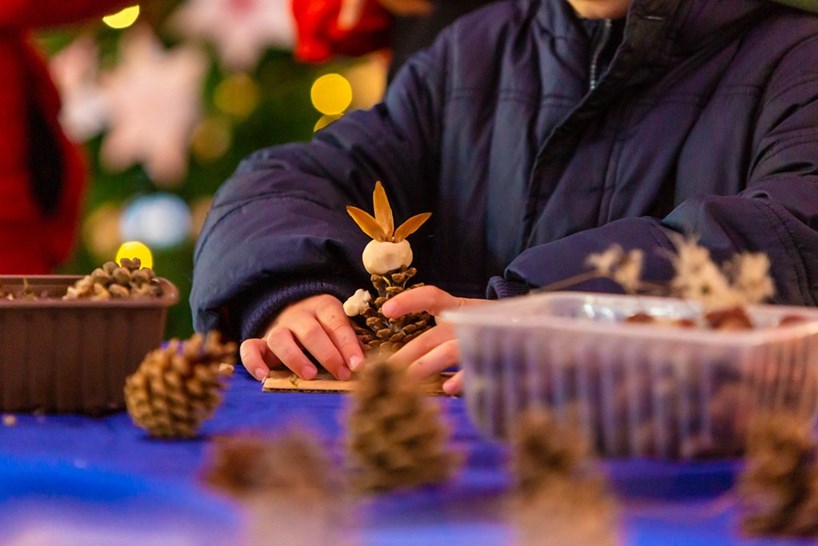 Shoppers at one of St Mary’s Eco Church pop-ups make creatures to help to complete a Christmas scene, alongside Nine Elms Arts Ministry, last December