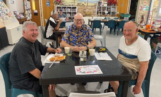The Rev'd Steve Wockner enjoying breakfast with Alan and his carer, Pete