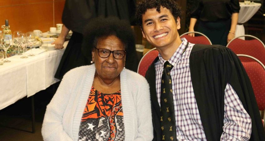 Saibai Elder Aunty Dr Rose Elu and Erub student Aiden Wu at St John's College within the University of Queensland on 18 September 2023