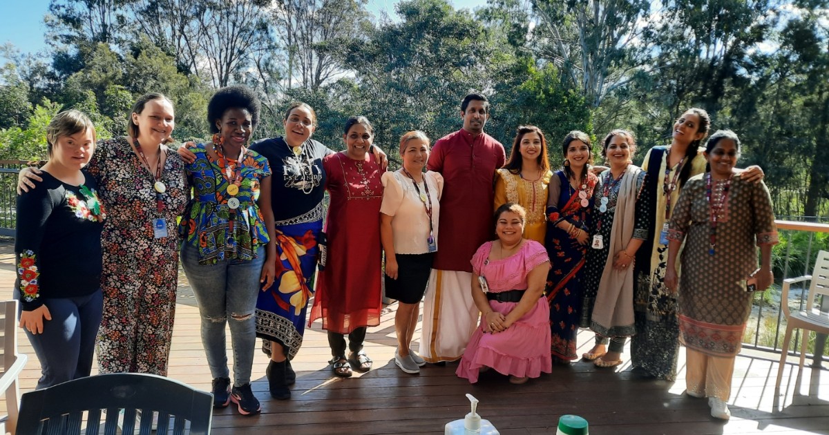 Anglicare Southern Queensland Facebook on 17 August 2023: "This month, staff across our services have been highlighting Multicultural Queensland Month in different ways. 😊At Symes Grove Residential Aged Care, staff celebrated by wearing beautiful clothing of their cultures, sharing traditional foods, and highlighting customs. Don't they look marvellous?"