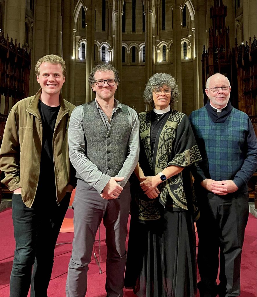 Dom Fay, Rev. Suzanne Grimmett, The Very Rev. Dr Peter Catt, and poet Pádraig Ó Tuama at a live recording of the On The Way podcast in St John’s Cathedral in 2023