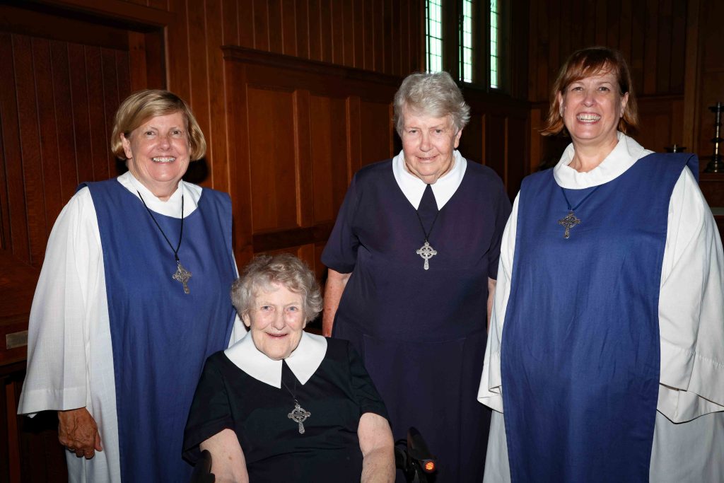 Four Society of the Sacred Advent sisters in a chapel 