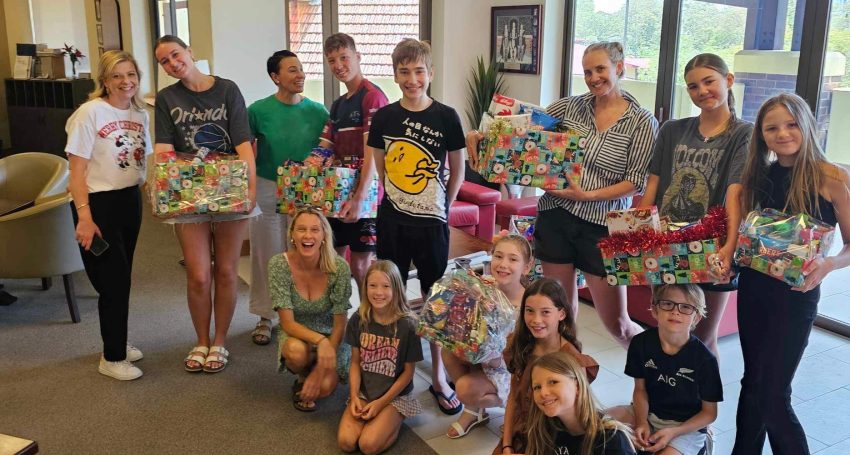 Resident families from The Southport School gathered on Thursday 14th of December at TSS to pack hampers for Anglicare Children's Youth and Families Clients along with Felicity Dougherty, Spiritual and Pastoral Care Coordinator for the Gold Coast from Anglicare Southern Queensland
