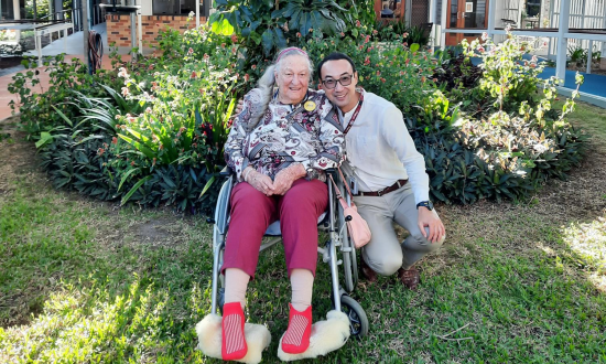 Edwin Marsden Tooth Memorial Home resident Mrs Olive Farr (L) and Anglicare Southern Queensland Spiritual and Pastoral Care Manager Colin Lim (R) in June 2023