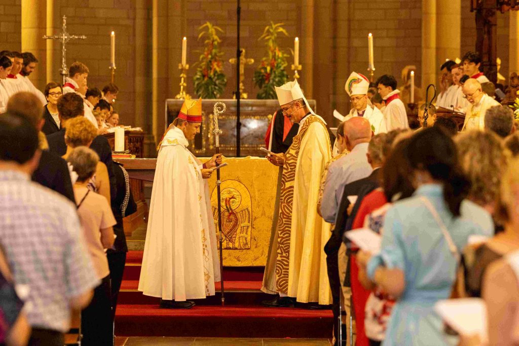 Archbishop Jeremy Greaves (holding the Diocesan crozier) and Bishop Cam Venables in the sanctuary of St John's Cathedral