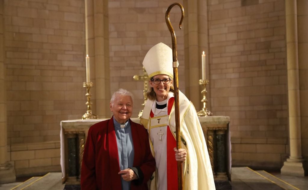 Young woman bishop with retired woman priest