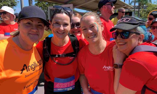 Five women at a fun run on a sunny day