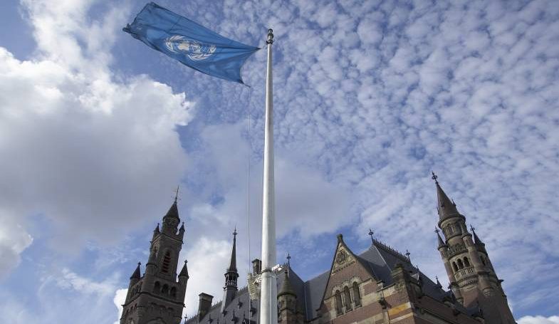 UN flag flying above building