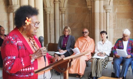 Torres Strait Islander elder speaking outside a Cathedral to inter-faith leaders