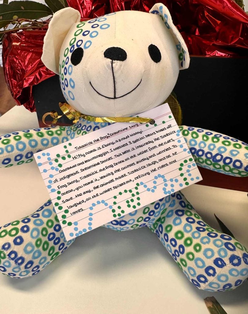 Teddy bear designed with Aboriginal frog theme