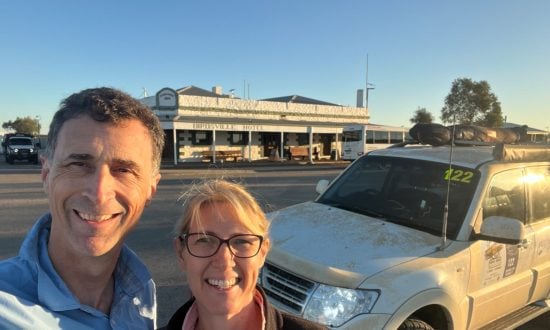 A man and a woman in front of an Outback pub