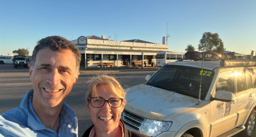 A man and a woman in front of an Outback pub