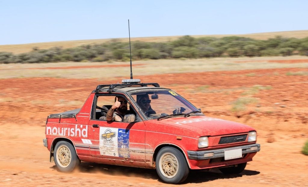 Red Mighty Boy car in the outback 