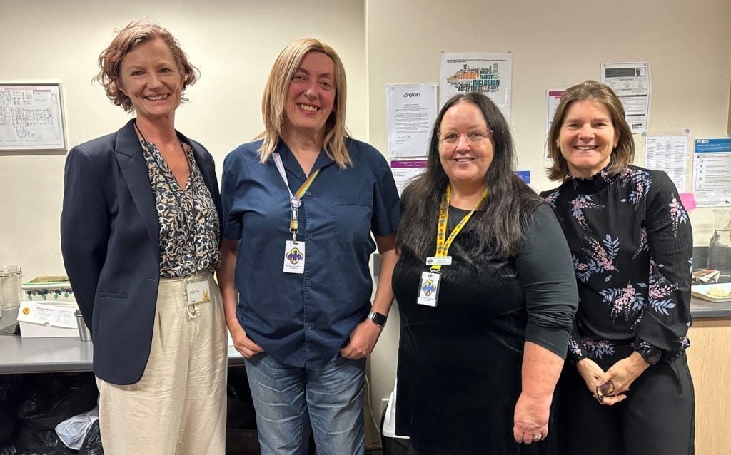 Four women in a Cathedral office 