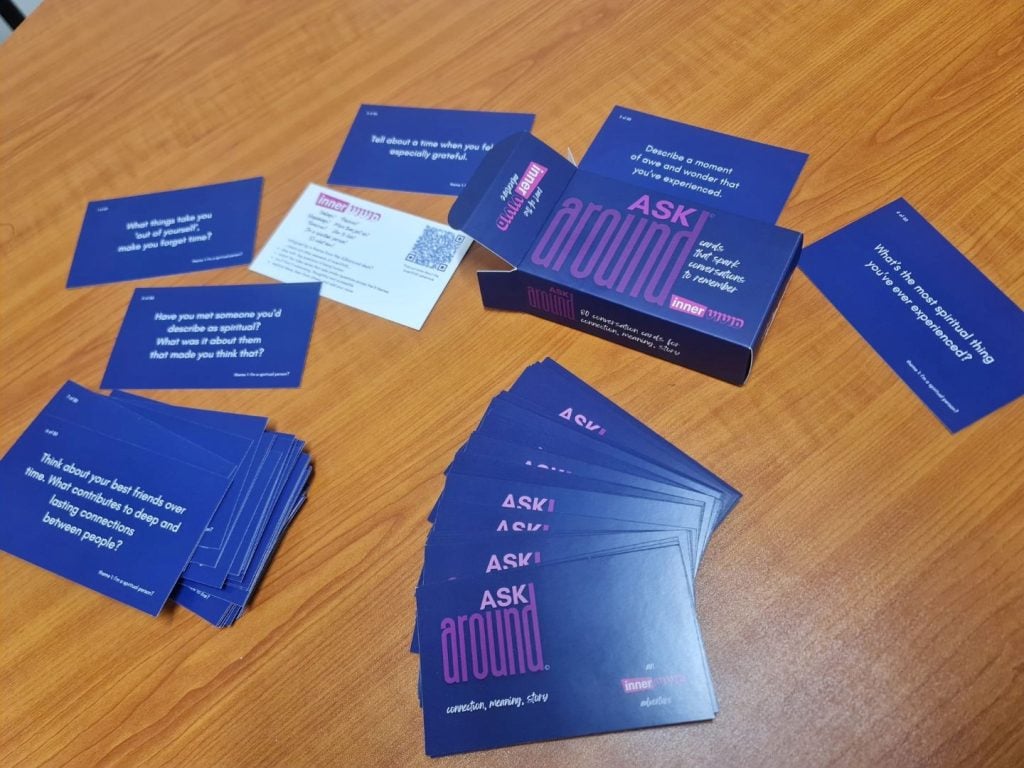 Purple cards with text on a brown table