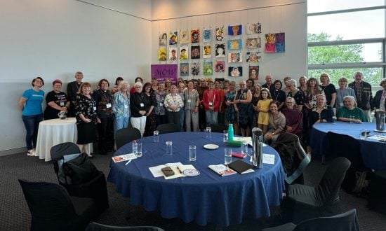 Large group of people at a conference gathered for a photo