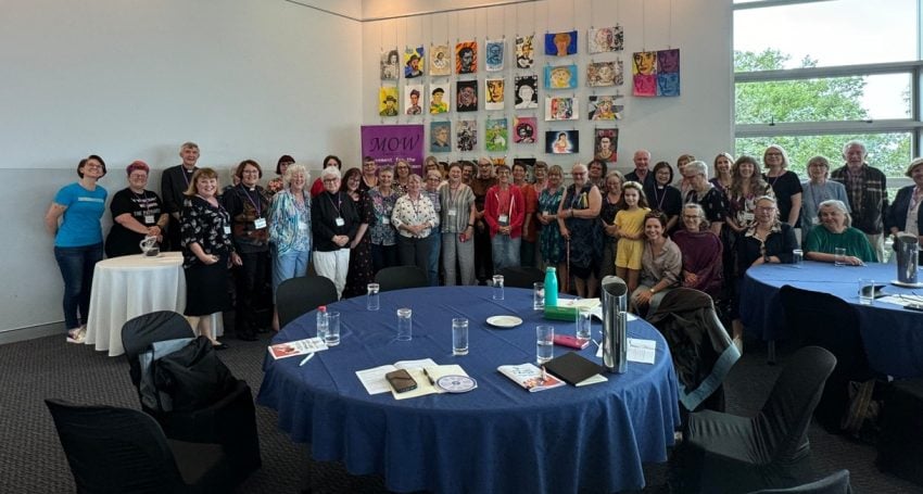 Large group of people at a conference gathered for a photo