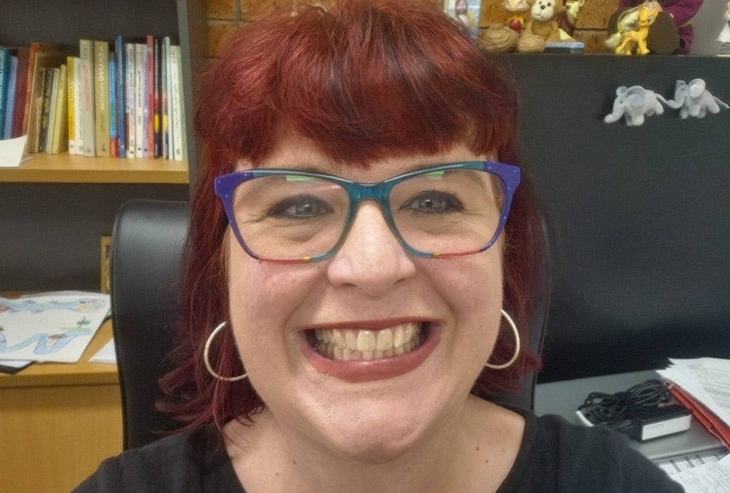 Close-up face of a woman wearing glasses