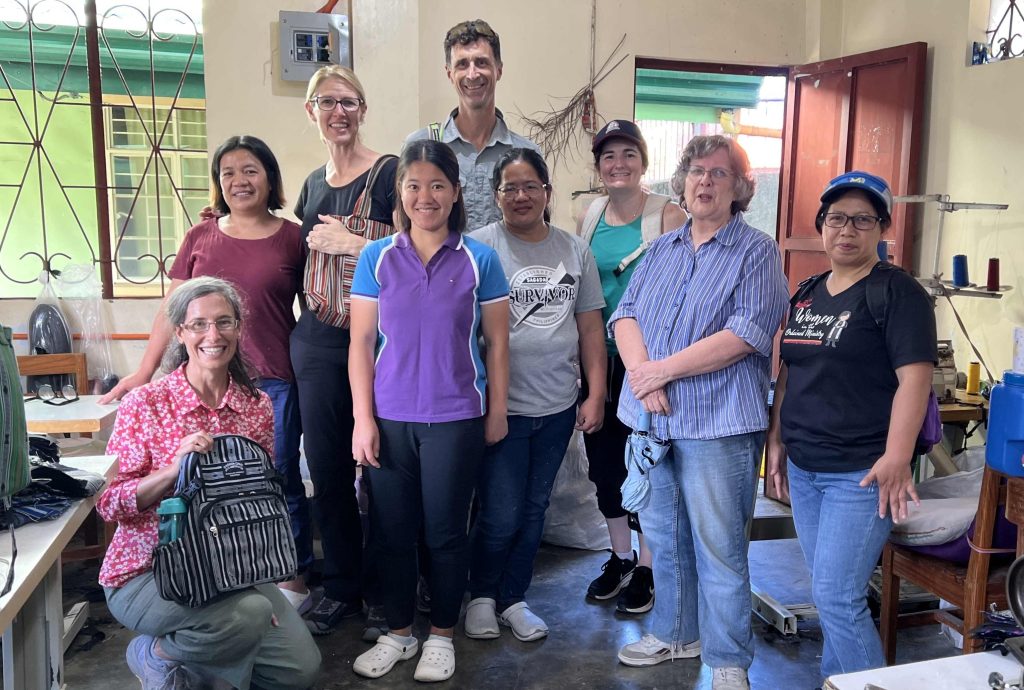 In Sagada, a local co-operative creates bags from local Igorot weaving. This parish activity provides employment for local young women (pictured) and supports parish life.