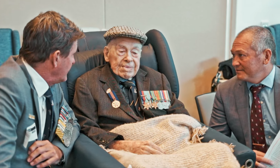 The Southport School’s students and staff join in the 105th birthday celebrations of the school’s oldest Old Boy, WWII veteran Joffre Bell, while gathering for an Anzac Day service