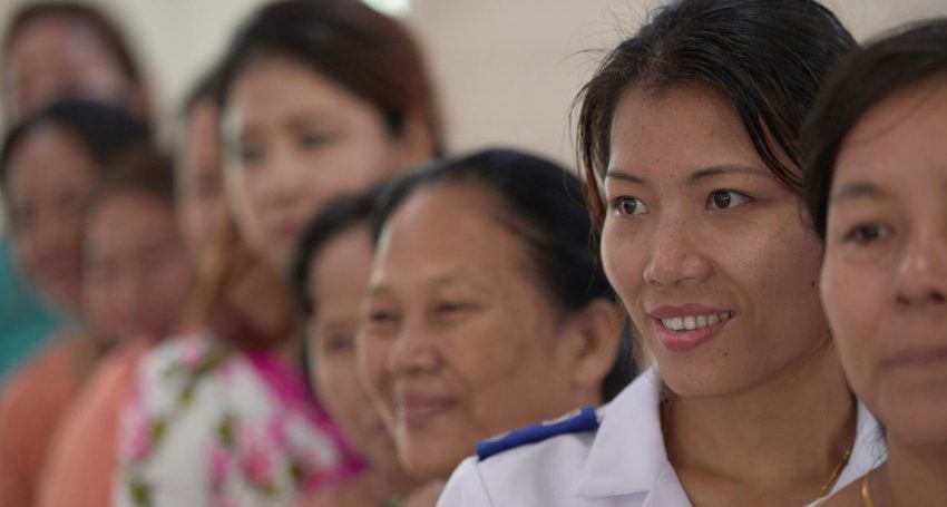 A group of women from Myanmar pose for a photo