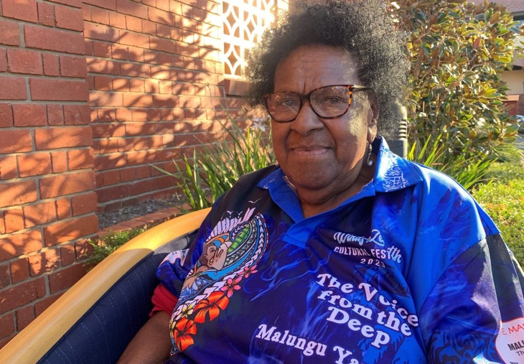 Torres Strait Islander elder wearing blue t-shirt
