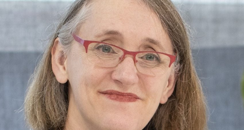 Woman in glasses smiling