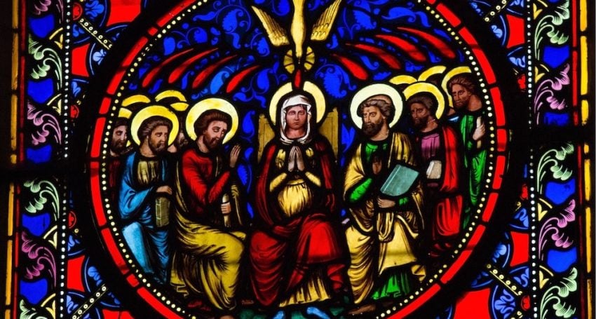Stained-glass window of Mary and the disciples during Pentecost