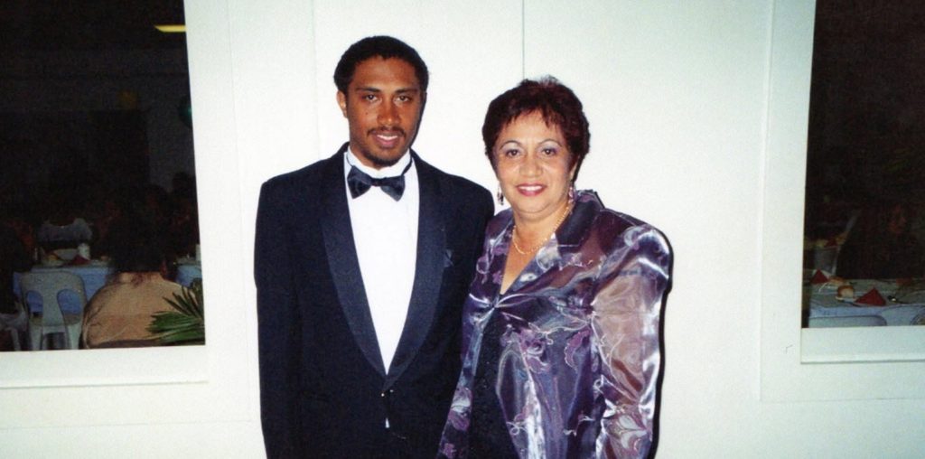 Son and mother at a ball in 2005