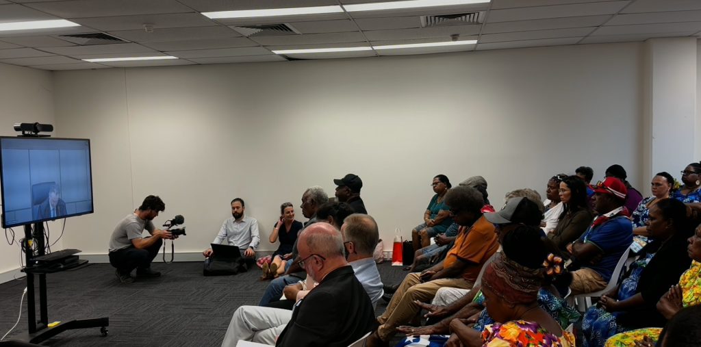 People in a court viewing room