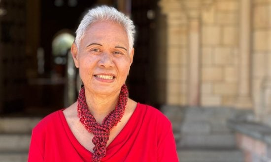 Tongan woman priest outside a Cathedral