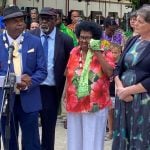 Elders outside courthouse